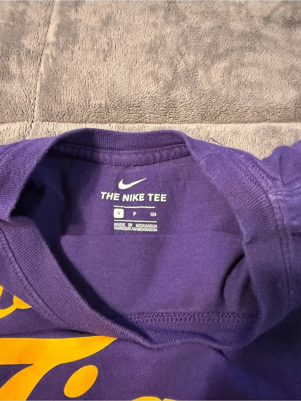 Nike Purple Tee with Yellow Graphic Accent